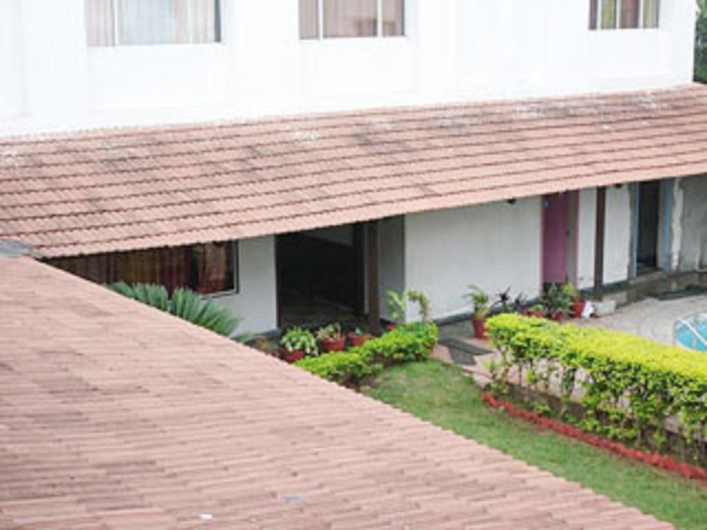 Dejavu Hotell Coimbatore Eksteriør bilde